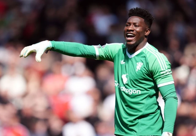 Manchester United goalkeeper Andre Onana looks on