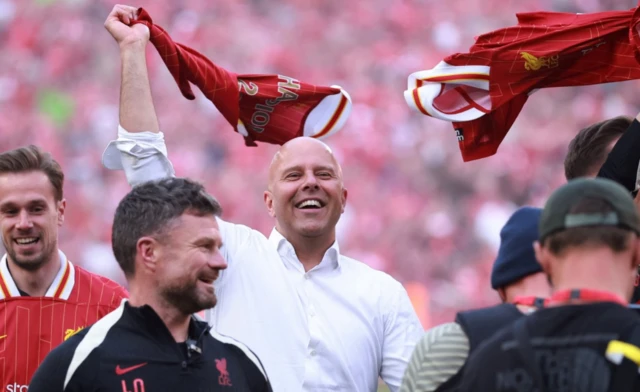 Liverpool manager Arne Slot and teammates celebrate
