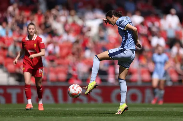 Rosella Ayane of Tottenham Hotspur shoots during the Barclays Women's Super League match between Liverpool FC and Tottenham Hotspur FC at the Totally Wicked Stadium on April 27, 2025 in Liverpool, England.