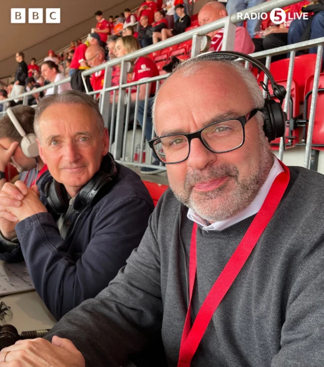Pat Nevin and Ian Dennis pose in the stands at Anfield