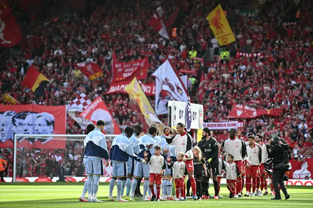 Players shake hands ahead of kick-off