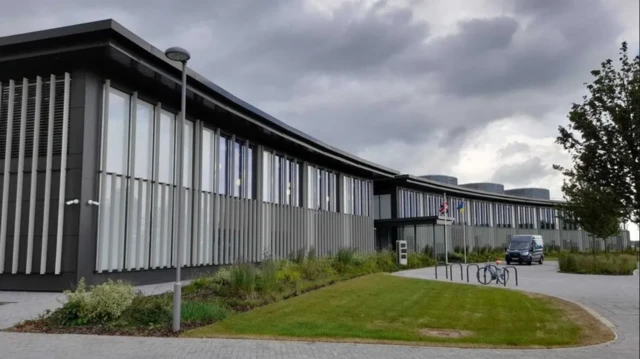 Outside of New Shire Hall in Alconbury Weald, the county council's offices.
