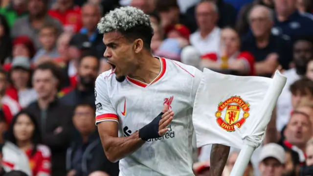 Luis Diaz celebrates scoring at Old Trafford