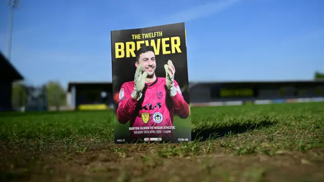 A view across the Pirelli Stadium with the matchday programme visible