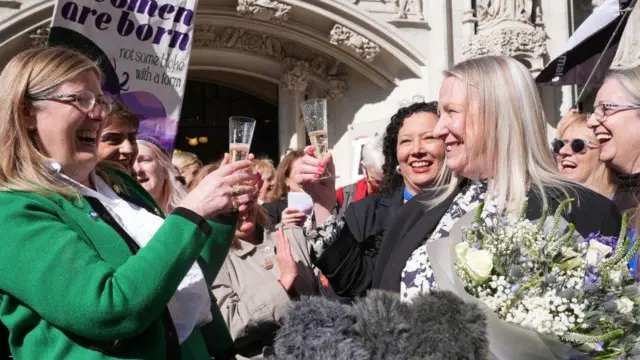 Campaigners from For Women Scotland celebrate the Supreme Court's judgement earlier this month