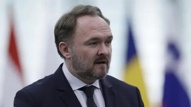 Dan Jorgensen, European Commissioner for Energy and Housing looks ahead, wearing a black suit and tie.