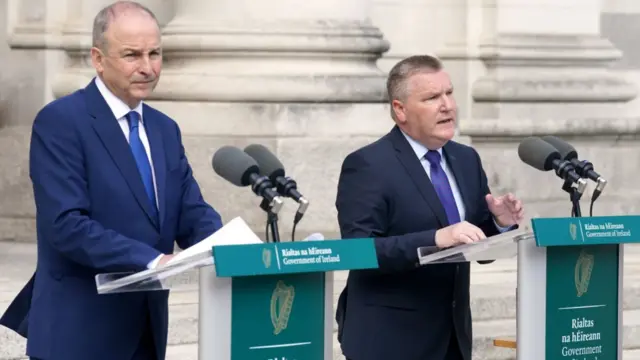 Taoiseach Micheal Martin (left) and Michael McGrath (right), EU Commissioner for Democracy, Justice, the Rule of Law and Consumer Protection, during a press conference following their meeting at Government Buildings in Dublin, over the 20% tariff on imports from the EU announced by US President Donald Trump