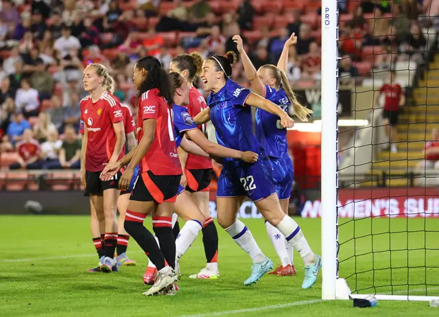 Bronze celebrates her goal with Kaptein and Beever-Jones