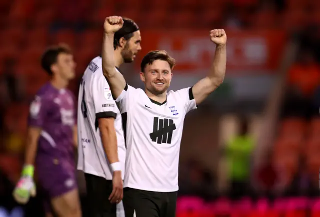 Alfie May celebrates