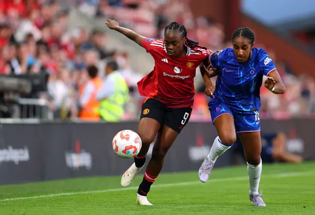 Girma tackles Awujo on the wing