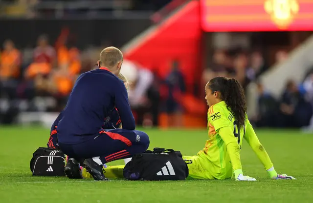 Tullis-Joyce receives treatment from the physios