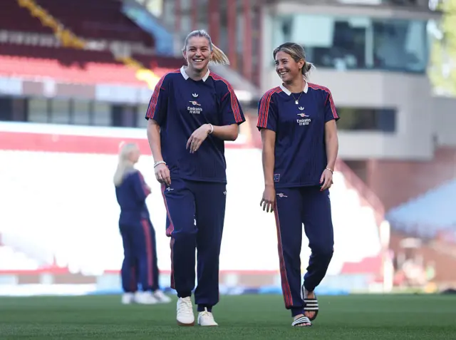Russo and Cooney-Cross walk across the pitch at Villa Park