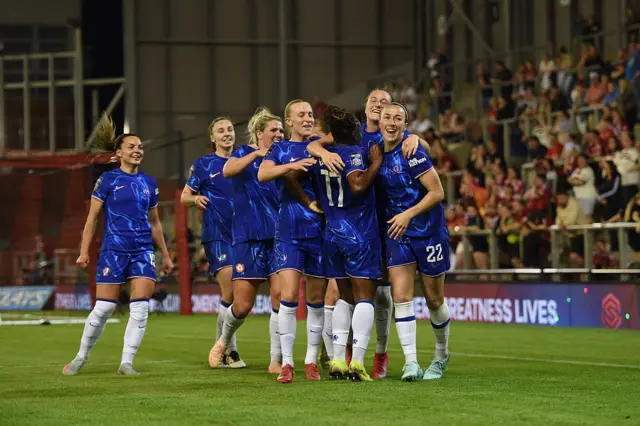 Chelsea players celebrate Bronze's opening goal