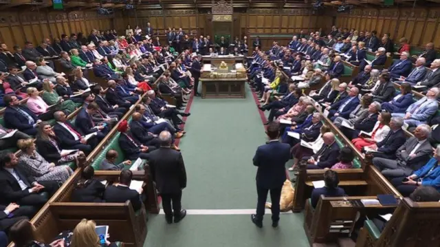 A full house for PMQs, with a few MPs standing