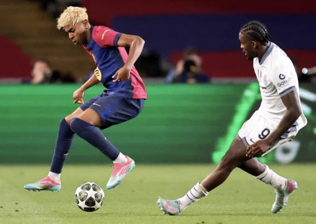 FC Barcelona's Lamine Yamal in action with Inter Milan's Marcus Thuram