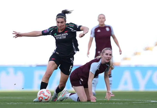 Mariona Caldentey of Arsenal is challenged by Missy Bo Kearns of Aston Villa during the Barclays Women's Super League match between Aston Villa FC and Arsenal FC at Villa Park on April 30, 2025 in Birmingham, England.