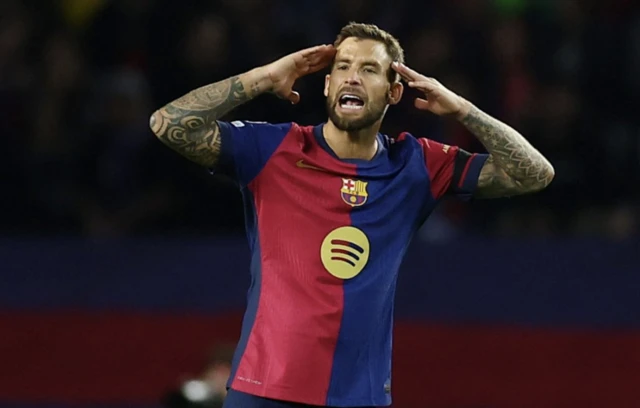 FC Barcelona's Inigo Martinez looks on