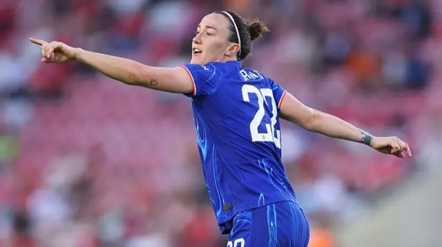 Lucy Bronze waves instructions to her teammates