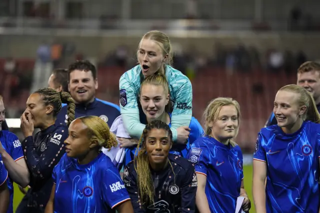 Chelsea celebrate as they win the league after the Barclays Women's Super League match at Leigh Sports Village, Manchester.