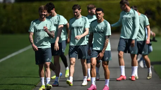 James Maddison of Tottenham Hotspur and Pedro Porro of Tottenham Hotspur walk out for a training session ahead of their UEFA Europe League 2024/25 semi final
