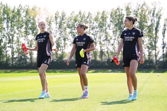 Williamson and Catley chat in training