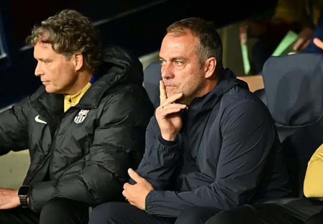 Coach Hansi Flick of FC Barcelona looks on