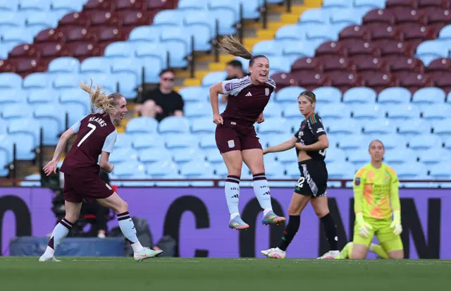 Kirsty Hanson of Aston Villa celebrates scoring her team's second goal during the Barclays Women's Super League match between Aston Villa FC and Arsenal FC at Villa Park on April 30, 2025 in Birmingham, England.