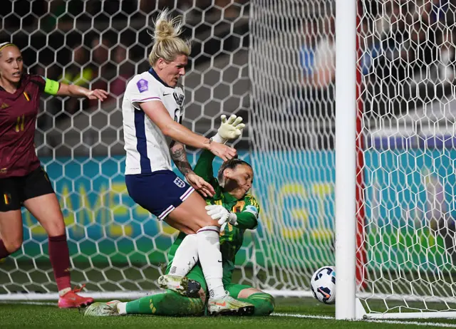 Millie Bright of England scores her team's second goal past Nicky Evrard