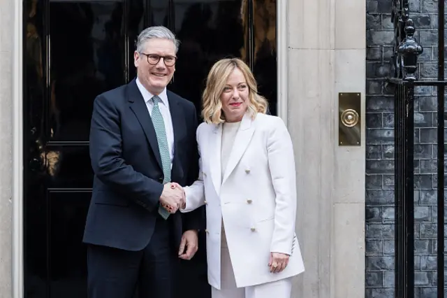 British Prime Minister Keir Starmer (L) welcomes Prime Minister of Italy Giorgia Meloni outside 10 Downing Street ahead of their meeting in London, United Kingdom