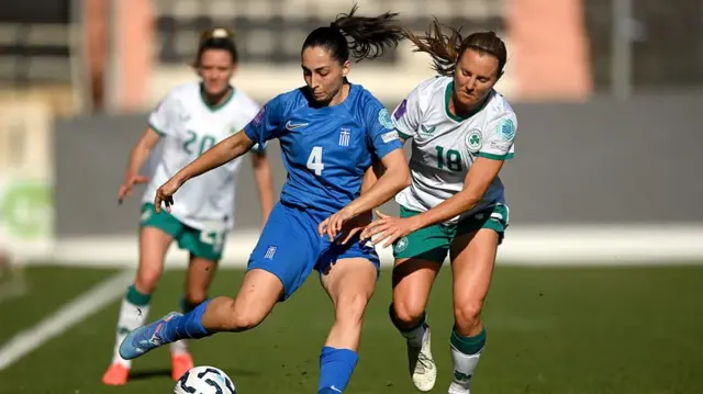 Maria Gkouni Papaioannou of Greece in action against Kyra Carusa of Republic of Ireland