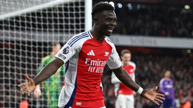 Bukayo Saka of Arsenal celebrates after scoring