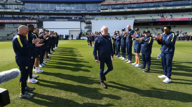 Keith Cook gets a guard of honour at Edgnaston before play got underway against Sussex today