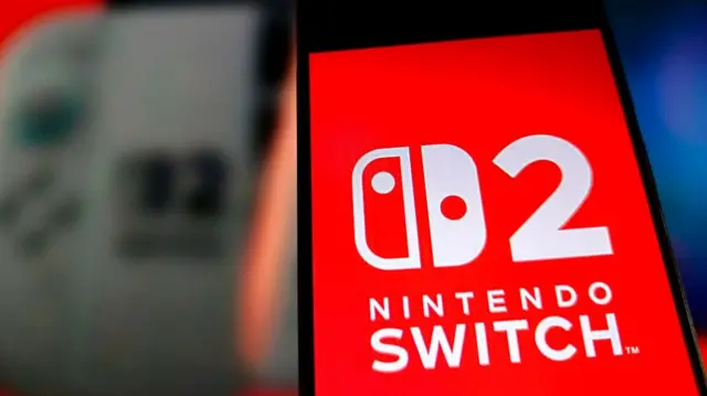 The logo of Nintendo Switch 2 is displayed on a smartphone screen
