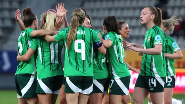 Northern Ireland celebrate Maxwell's goal