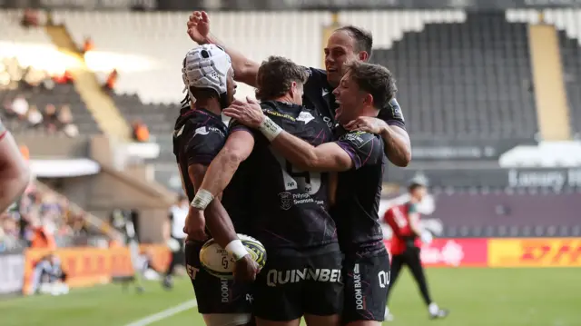 Ospreys players celebrate