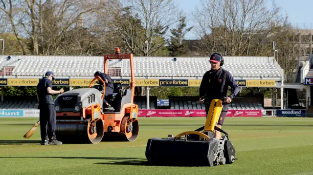 Ground staff preparing the pitch at Chelmsford