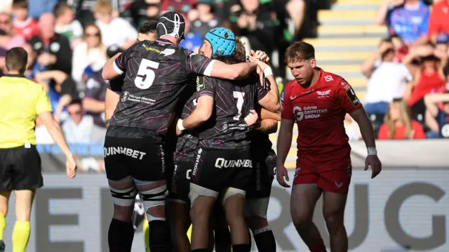 Ospreys players celebrate