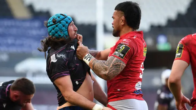 Justin Tipuric and Vaea Fifita exchange words