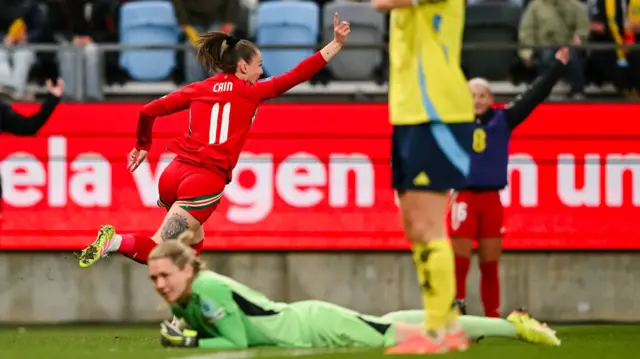 Hannah Cain celebrates