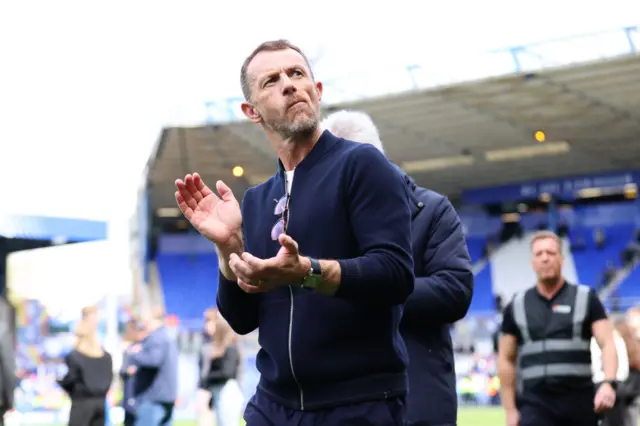 Gary Rowett, Interim Manager of Birmingham City, applauds the fans after Birmingham City are relegated to League One despite defeating Norwich City