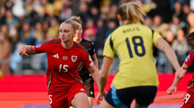 Elise Hughes attacks for Wales