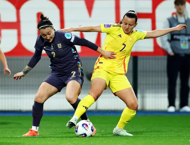 England's Lucy Bronze in action with Belgium's Hannah Eurlings