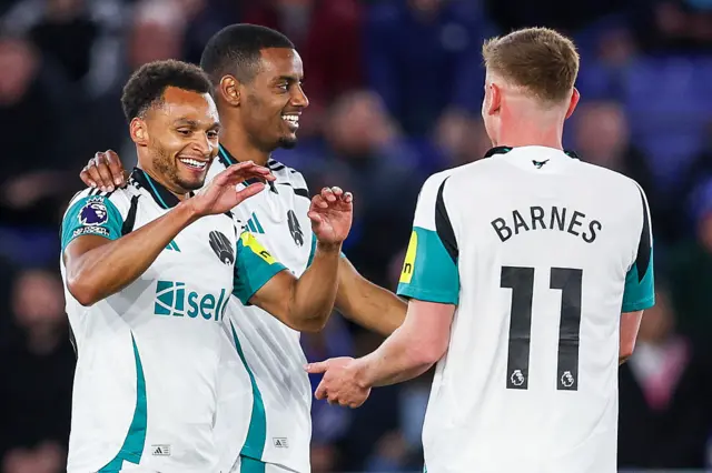 Jacob Murphy celebrates with Alexander Isak and Harvey Barnes