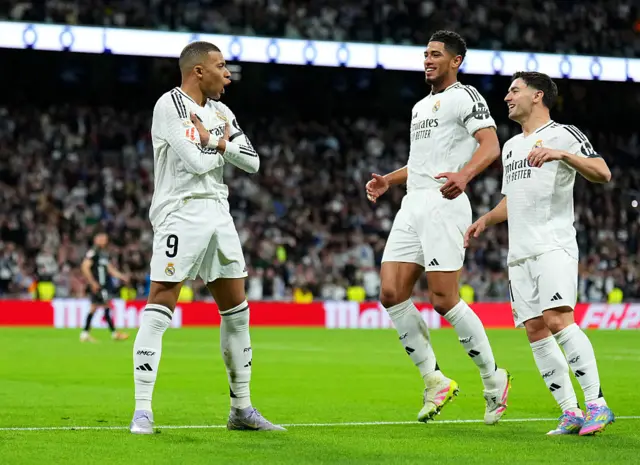 Kylian Mbappe celebrates with Jude Bellingham and Brahim Diaz