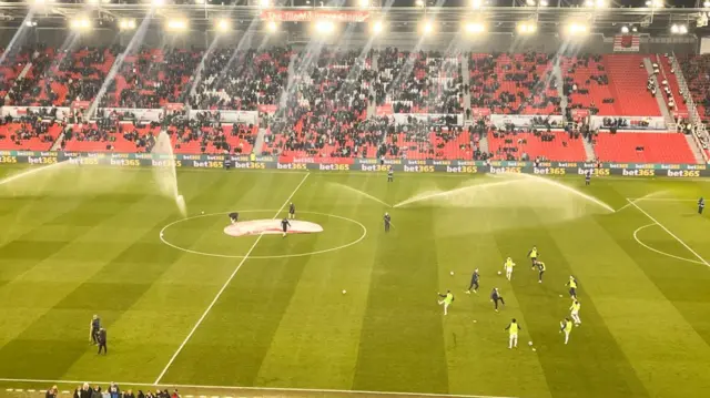 Sprinklers on at Stoke