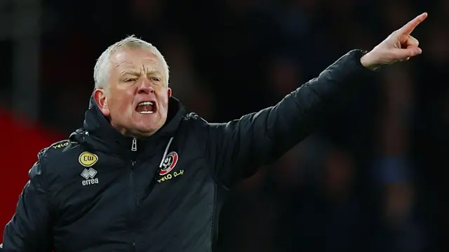 Chris Wilder points up