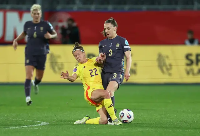 Belgium's Laura Deloose in action with England's Niamh Charles