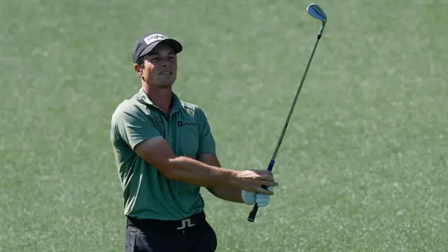 Viktor Hovland plays an iron shot