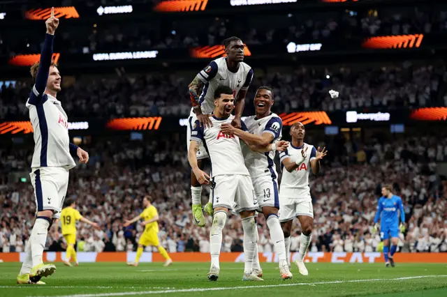 Dominic Solanke of Tottenham Hotspur celebrates scoring his team's third goal with teammates