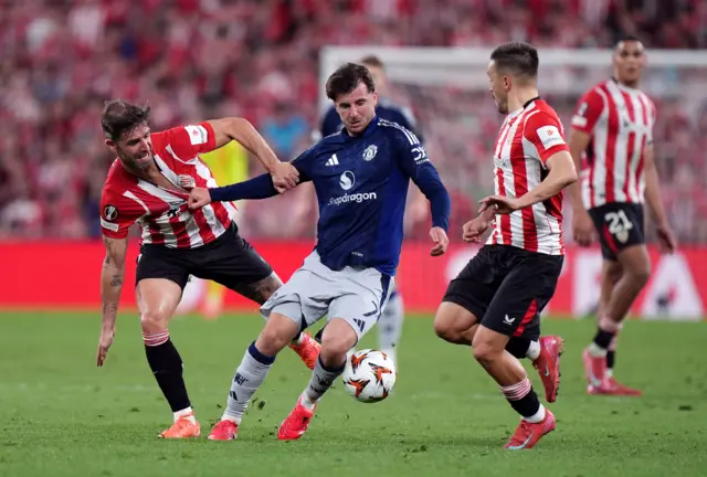 Manchester United's Mason Mount and Athletic Bilbao's Yeray Alvarez (left) battle for the ball